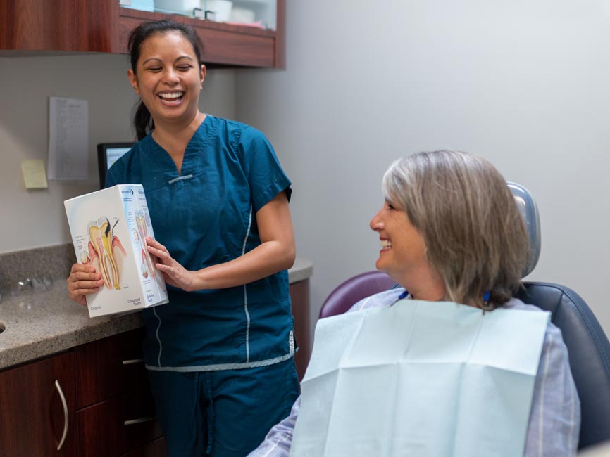 Doctor conversing with young patient